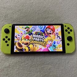 NINTENDO SWITCH OLED with 125 SWITCH GAMES