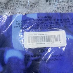 Supreme “America Eats They Young” Tee