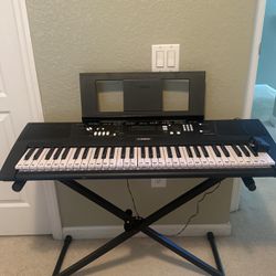 keyboard music with stand and cable