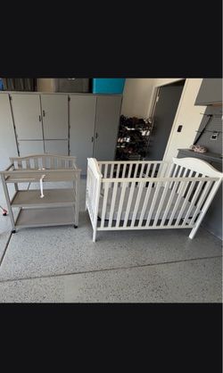 Brand new baby crib with new mattress, changing table