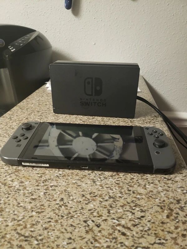 Nintendo switch charging console and games