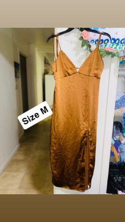 dress is a shimmery bronze color