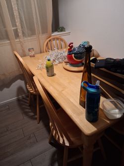Six chairs wood table almost new