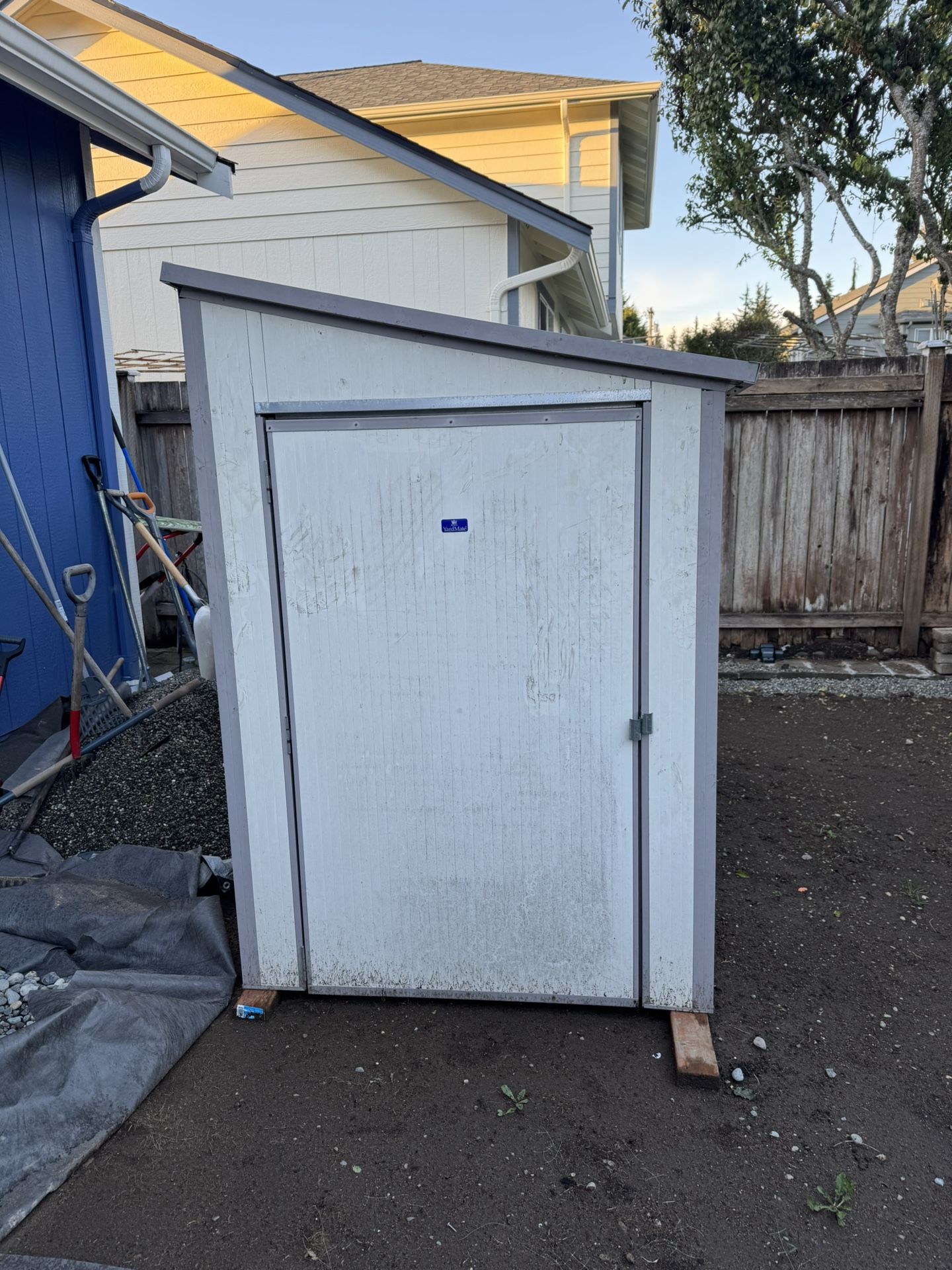 Used aluminum 4’Wx7’LX5.5’H Storage shed