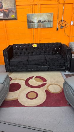 Black suede sofa
