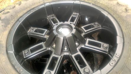Four 33 x 12.50 R 18 LT wheels