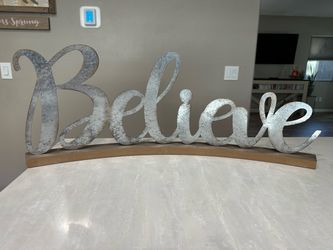 Believe metal and wood decor sign