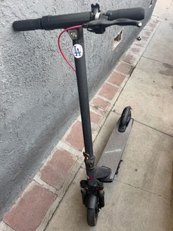Xl electric scooter with front forks shocks 18 mph