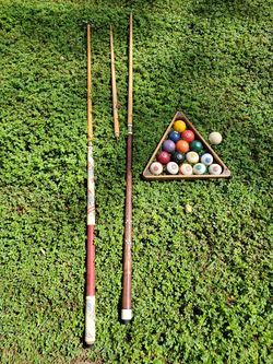Pool balls, budweiser stick & another stick
