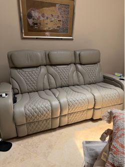 Matching taupe power reclining sofa set - like new
