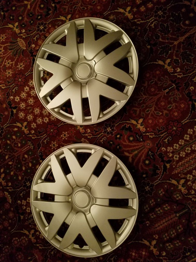 Hubcaps(2) for a Toyota Sienna ?2007. Make artwork out of them.