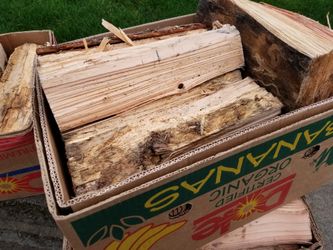 Boxes of dry-seasoned firewood... (Ask about delivery)