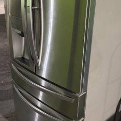 Refrigerator Four Door Stainless Steel Like New 