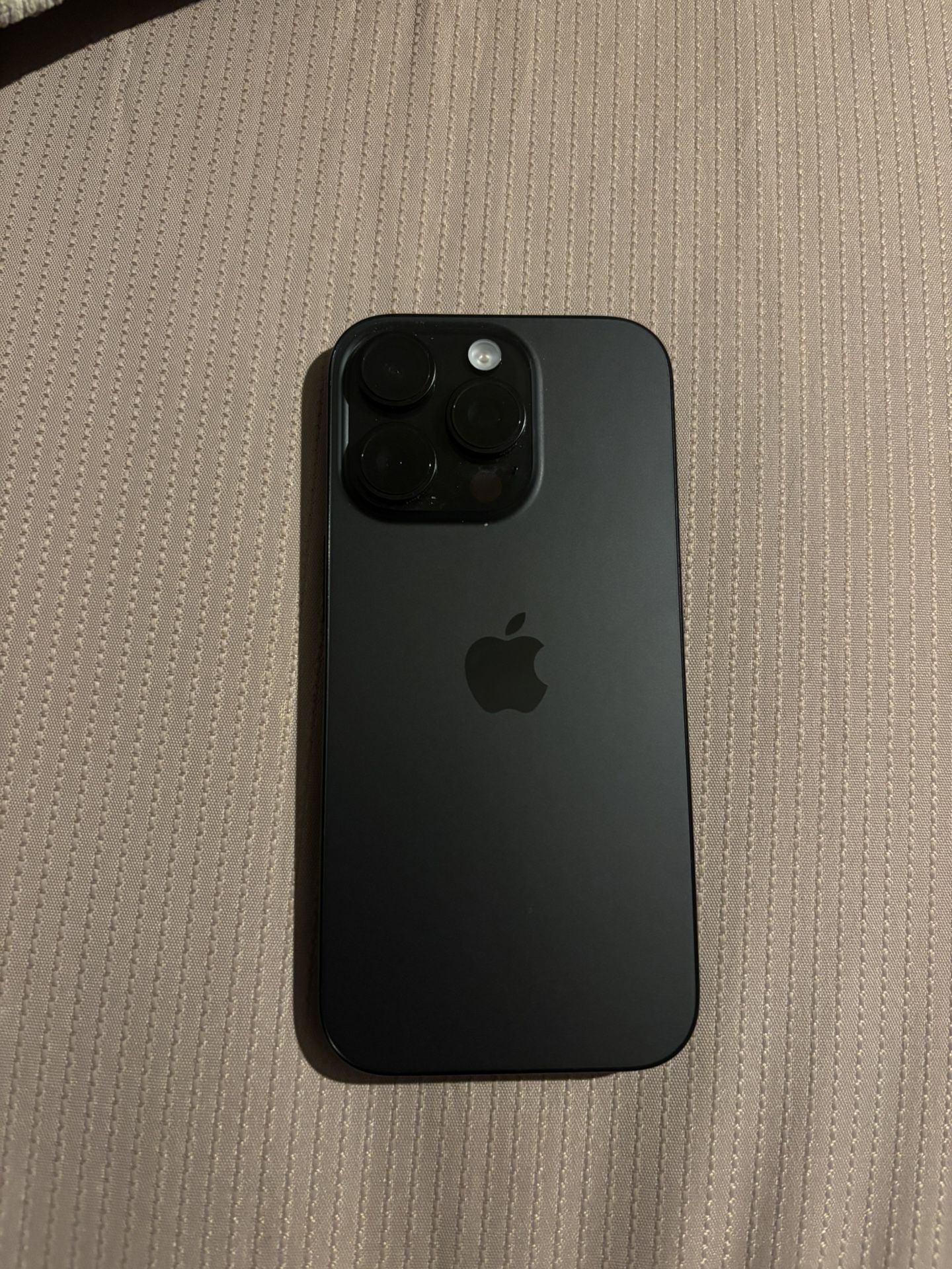 iPhone 16 Pro and AirPods