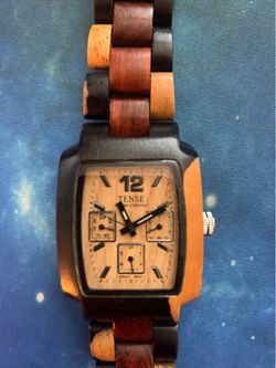 Elegant wooden Watch by Tense with a unique multicolor band.
