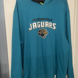 Jacksonville  Jaguar’s Large, Reebok Reversible  pull- over Hoodie