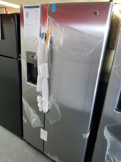 New scratch and dent GE 26cu.ft stainless steel side by side refrigerator 1 year warranty