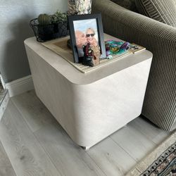 Two end tables and one coffee table