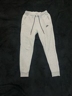 Grey Nike tech sweatpants