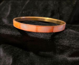 Vintage Brass Gold-Tone Bangle Bracelet featuring a Pink Mother-of-Pearl or Abalone Shell inlay.