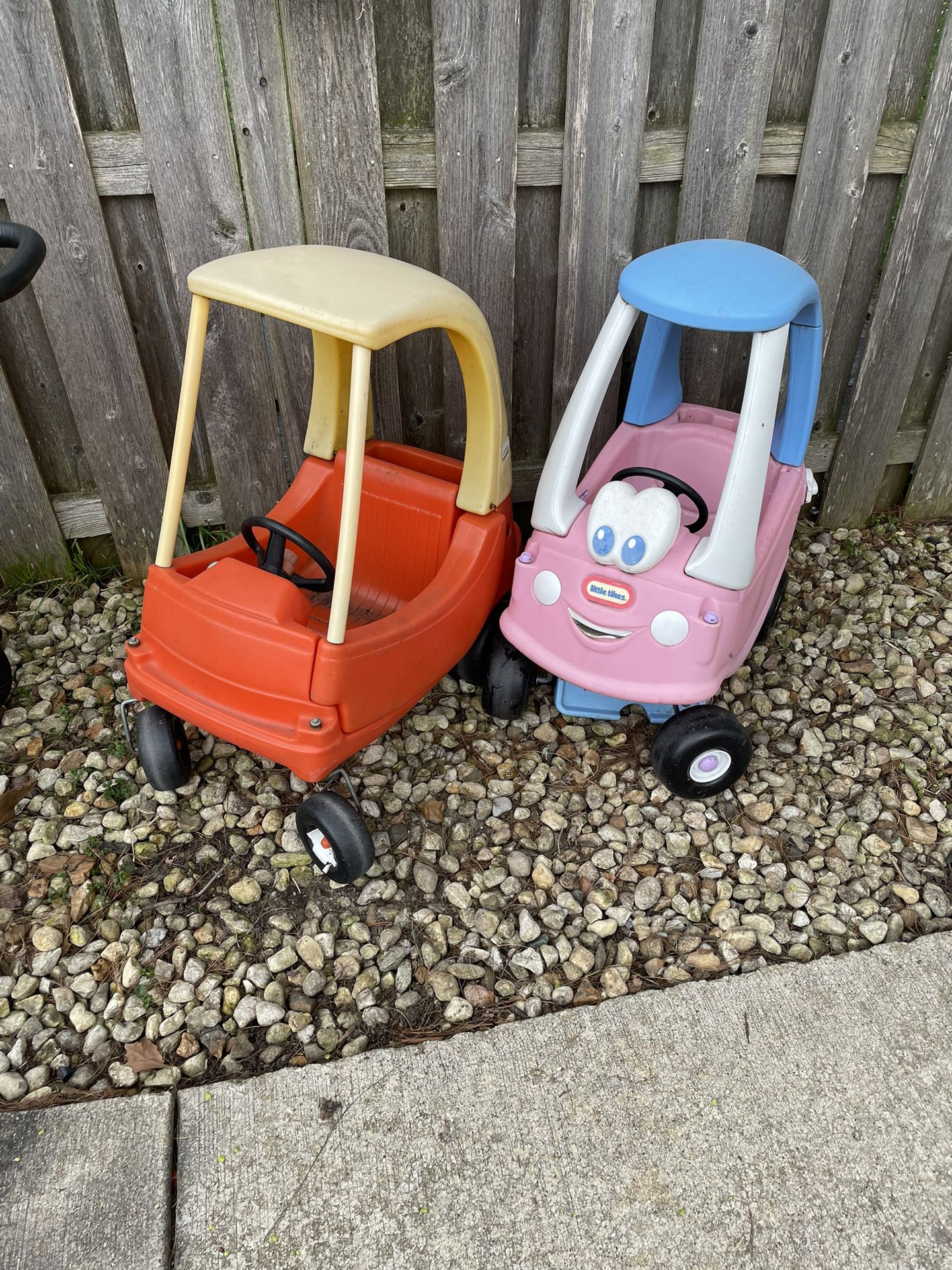 Pair Of Kids Feet Power Cars