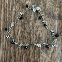 Ornate Metal With Flower And Black Faceted Gemstone 10’ Anklet 