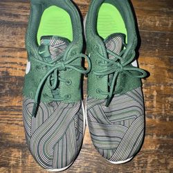Nike Roshe Run men's running shoes in multi greens/white striped.