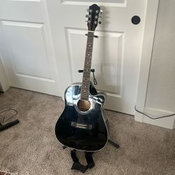 Acoustic Guitar With Stand And Case 