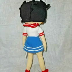 Betty boop doll sailor with a flag