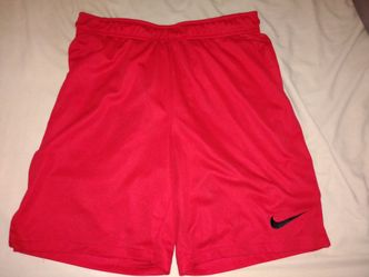 Men's Red Nike Dri-fit athletic shorts with black swoosh