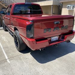 Dodge Ram 1500. Quad Cab 95k Miles over 30k in upgrades 2008 hard custom paint Tonneau cover, Bed-rug bed liner, 22 inch rim’s, DVD player, too much m