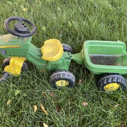 3-Wheeled Pedal Tractor with Trailer  Two-position adjustable seat to be able to accommodate your children as they grow Tractor is pedal-powered, and 