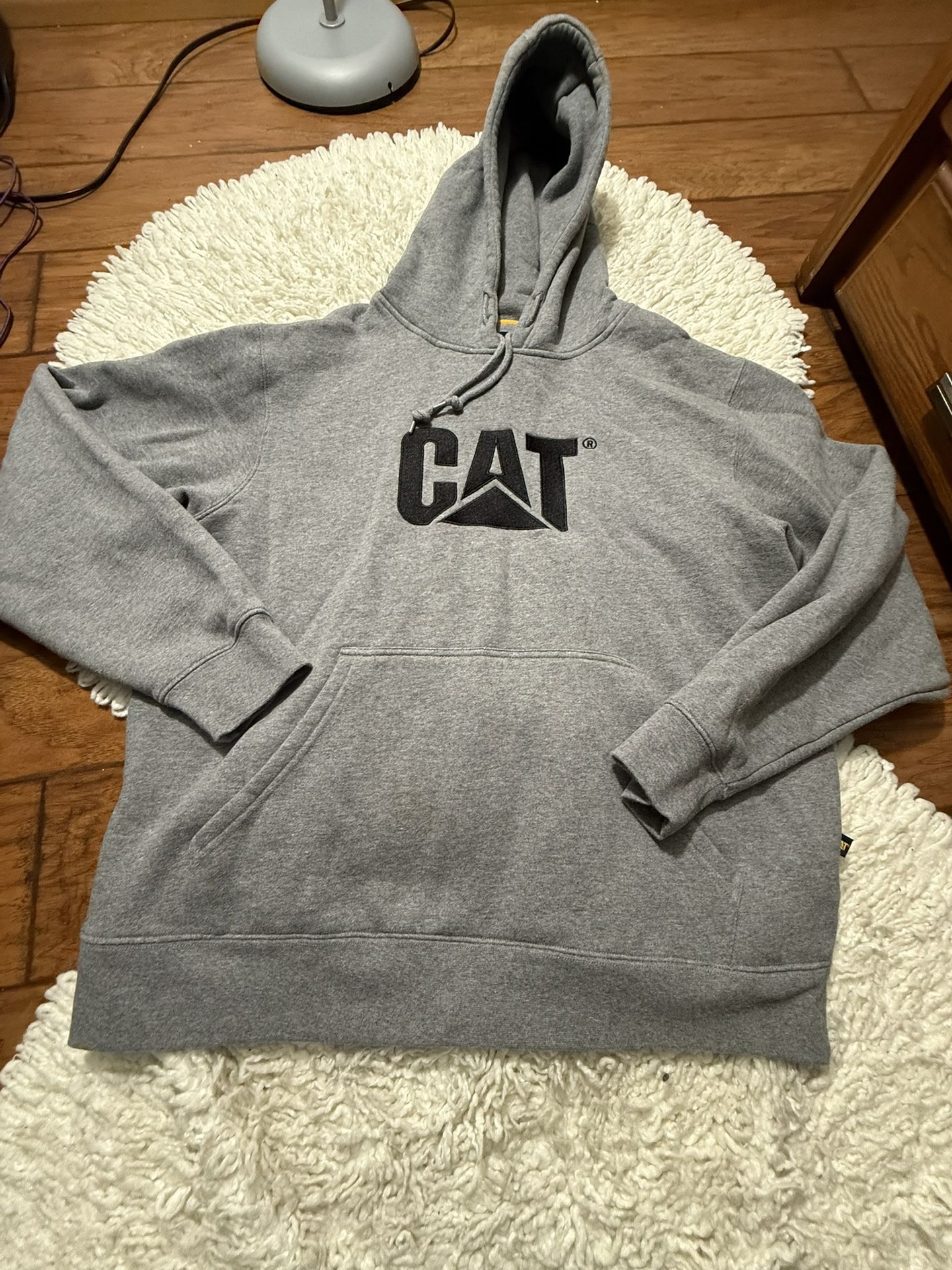 grey CAT Men's Trademark Pullover Hoodie made from a cotton-polyester fleece blend XL on tag