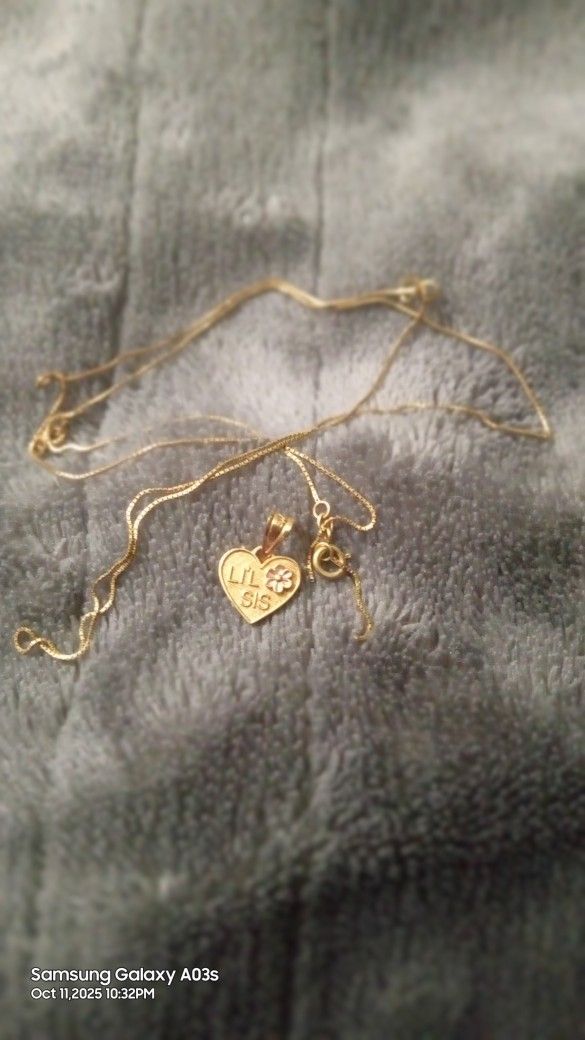 LIL SIS,    it's 24 Carat Gold  Neckless