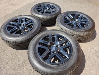 20" chevy silverado black factory wheels and tires