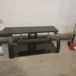 like new TV stand I have no use for it 130 sharp for it 