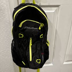 Eddie Bauer Brand New Stowaway Lightweight Backpack and black and lime green color