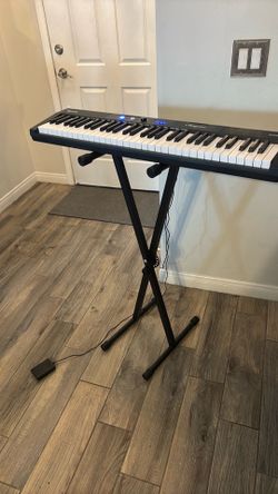 Piano with stand