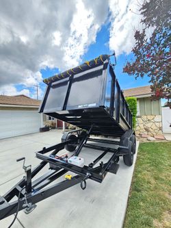 NEW DUMP TRAILER 12x8x4 12000 LBS
ROLLING TARP--SPARE TIRE,ELECTRIC BRAKES,HYDRAULIC SYSTEM,REMOTE CONTROL,IDEAL FOR HAULING, DEMOLITION, TRASH ETC,FO