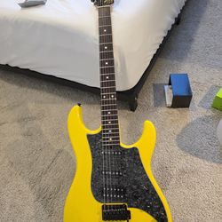 Tyler JTG yellow electric guitar