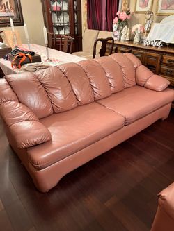 Pink leather couches