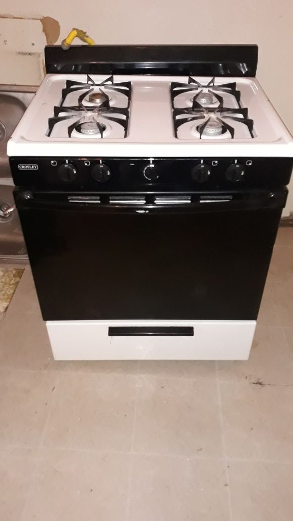 WORKING Gas stove, full size fridge, mirror, stainless ...