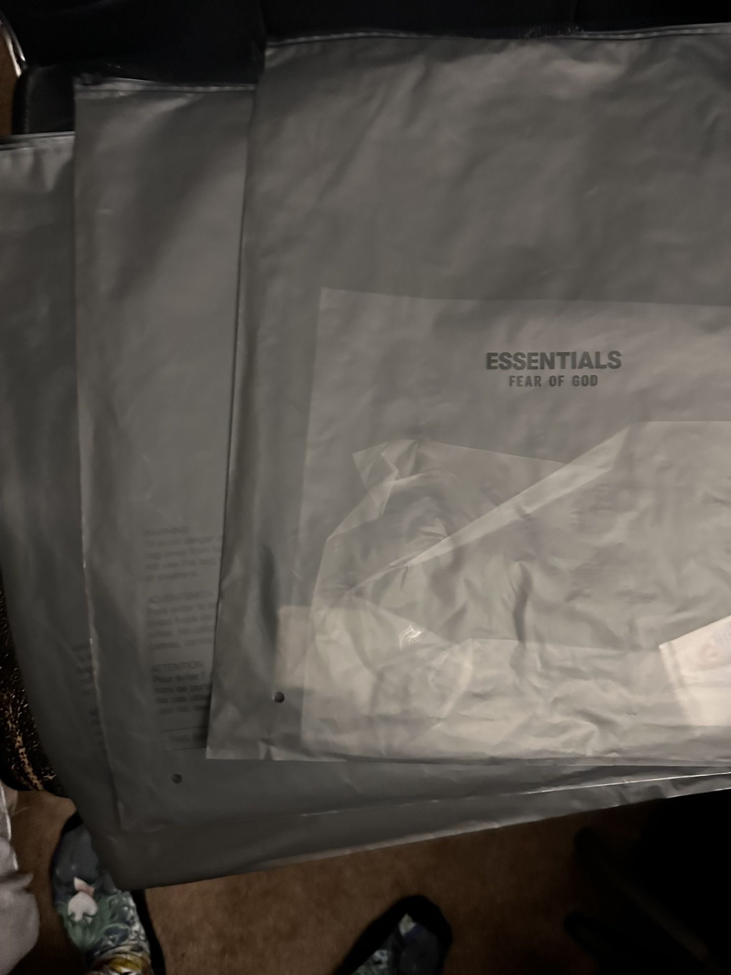 Authentic essentials, garment bags, big enough for sweaters and T-shirts and I have ones that are smaller as well for hats