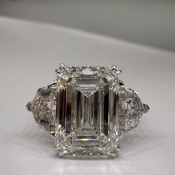5.10 carat E VVS2 emerald cut lab diamond with Cadillac side stones three stone 
