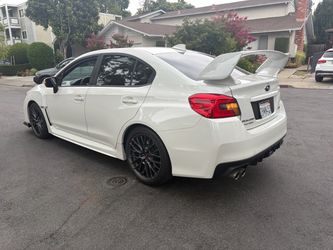 Oem subaru wrx sti rims with tires on
