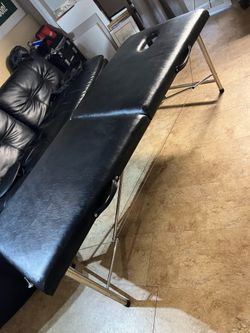 Massage table