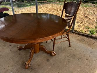 Round table with three chairs