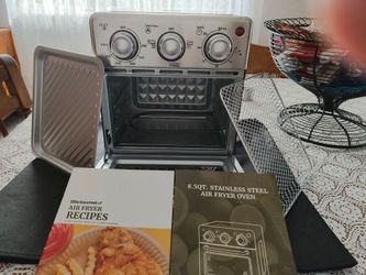 Mini countertop Stainless Steel Elite gourmet 8.5 quart air fryer. Only taken out of box for pic. Also toasts. Bakes, and broils