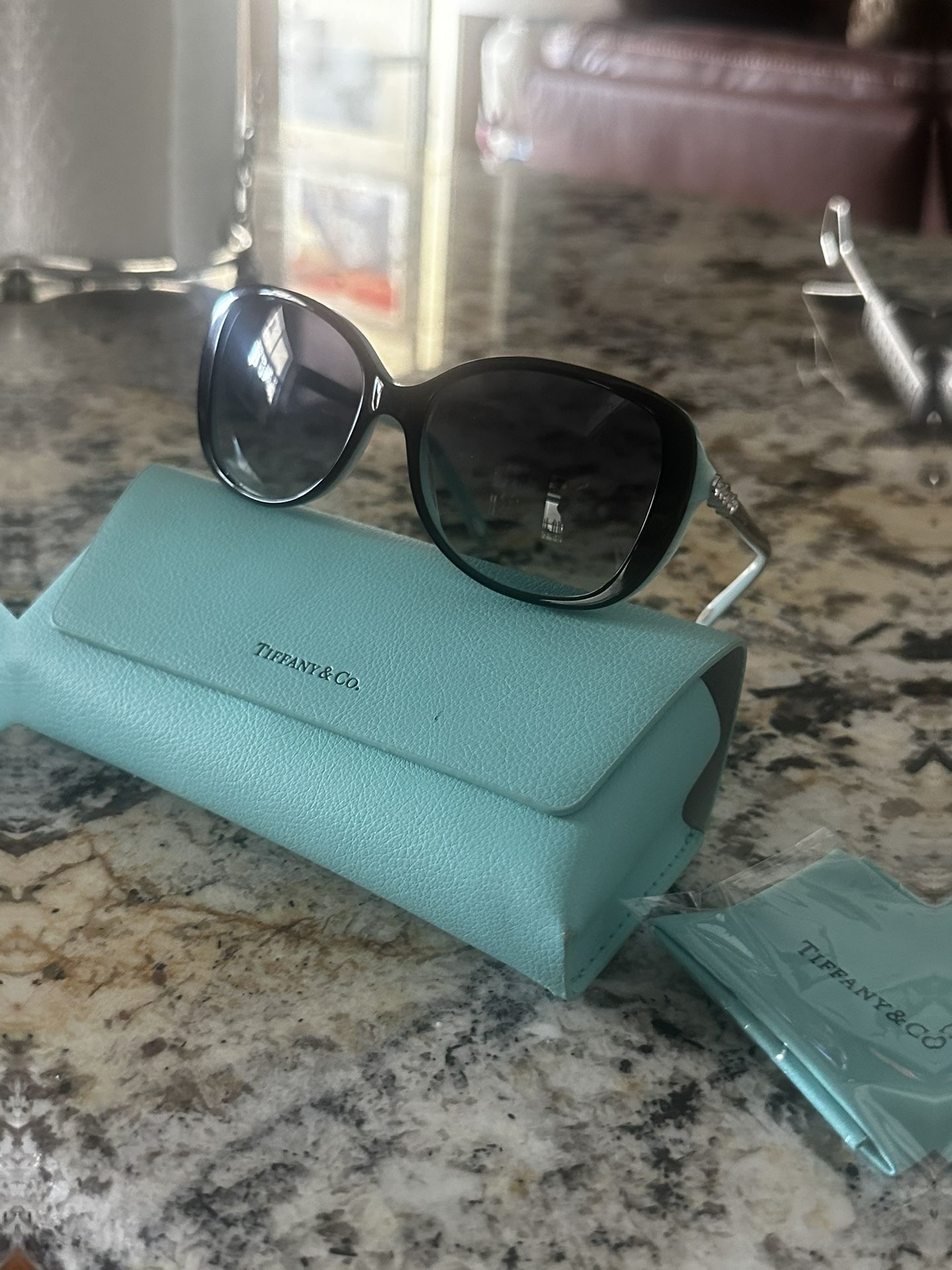 Tiffany and co sun glasses. Not a single scratch on them