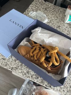 Lanvin curbs